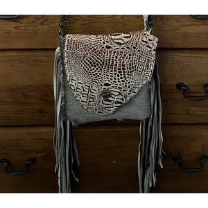 Myra Bag , never carried , brand new without tags. This is a conceal carry bag